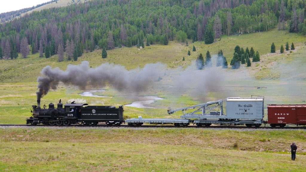 315 powers its train of eleven cars plus OB up the hill towards Cumbres. (photo; Mark Kasprowicz)